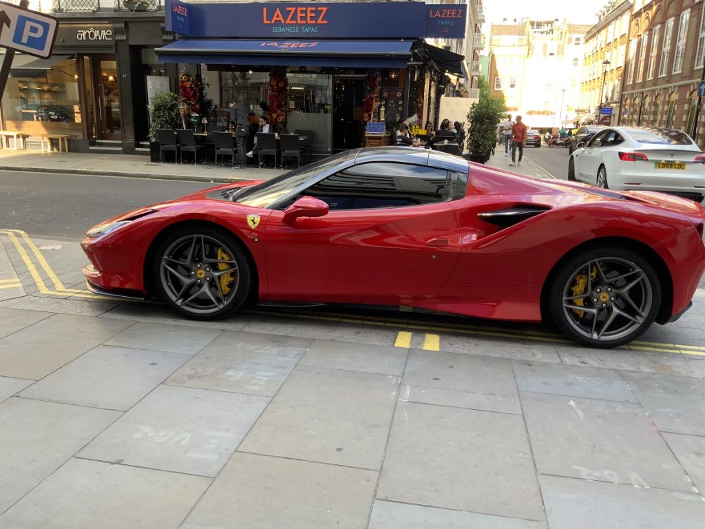 Red Ferrari outside Lazeez