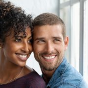 Man and woman smiling