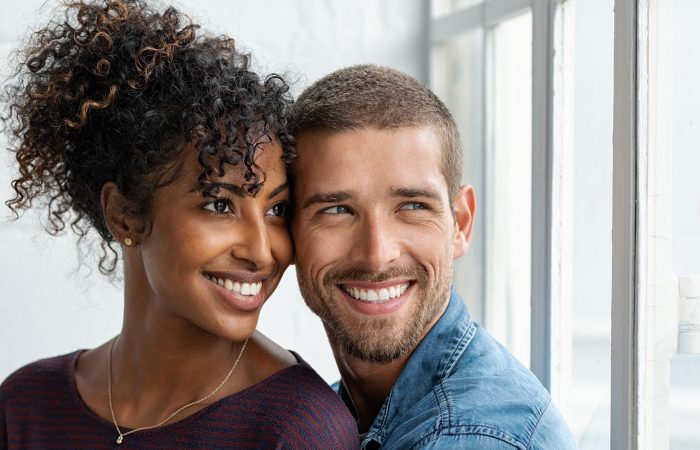 Man and woman smiling